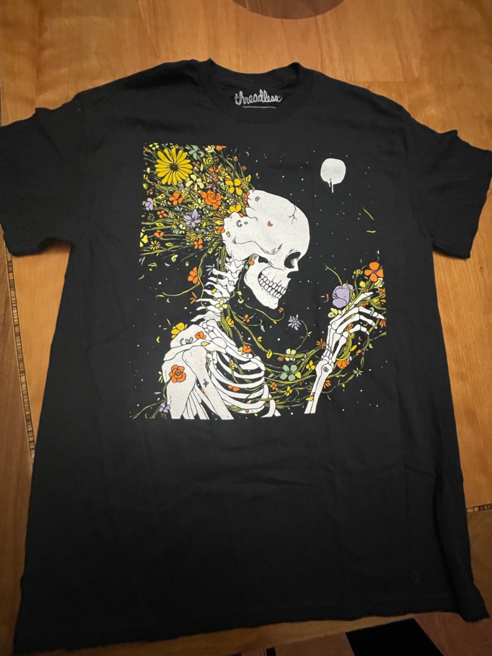 Threadless Black Tee with White skeleton and floral Print